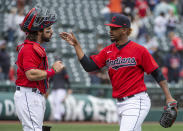 Cleveland Indians relief pitcher Emmanuel Clase is greeted by Austin Hedges after they defeated the Detroit Tigers in a baseball game in Cleveland, Sunday, April 11, 2021. (AP Photo/Phil Long)