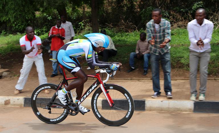A Rwandan cyclist competes in the first stage of the Tour of Rwanda in Kigali on November 17, 2014