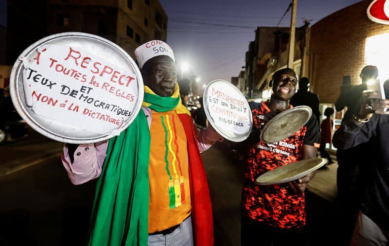 Senegal’s opposition supporters bang pots and pans in noisy protest