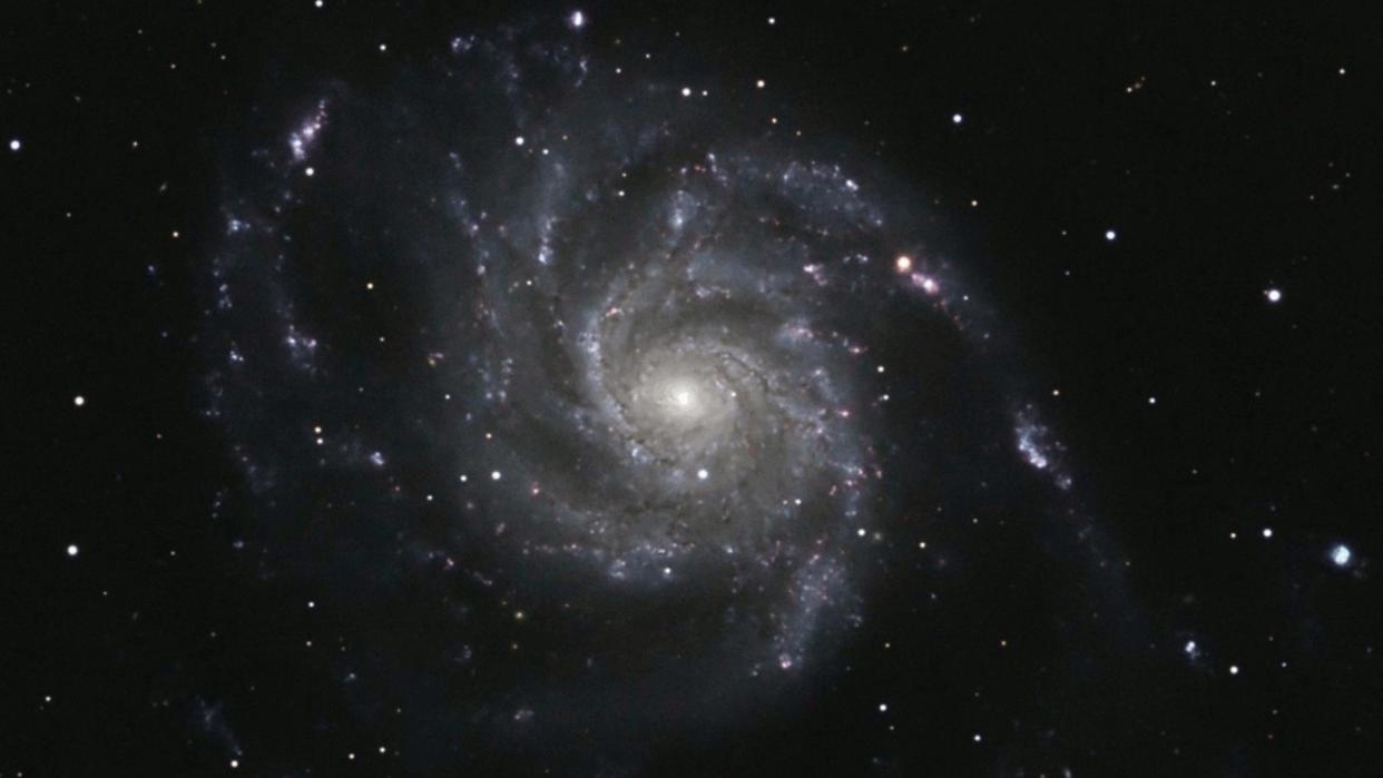  A spiral galaxy in deep space. 