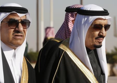 Saudi Arabia's Deputy Crown Prince Mohammed bin Nayef (L) arrives with his uncle King Salman (R) to greet U.S. President Barack Obama at King Khalid International Airport in Riyadh, January 27, 2015. REUTERS/Jim Bourg