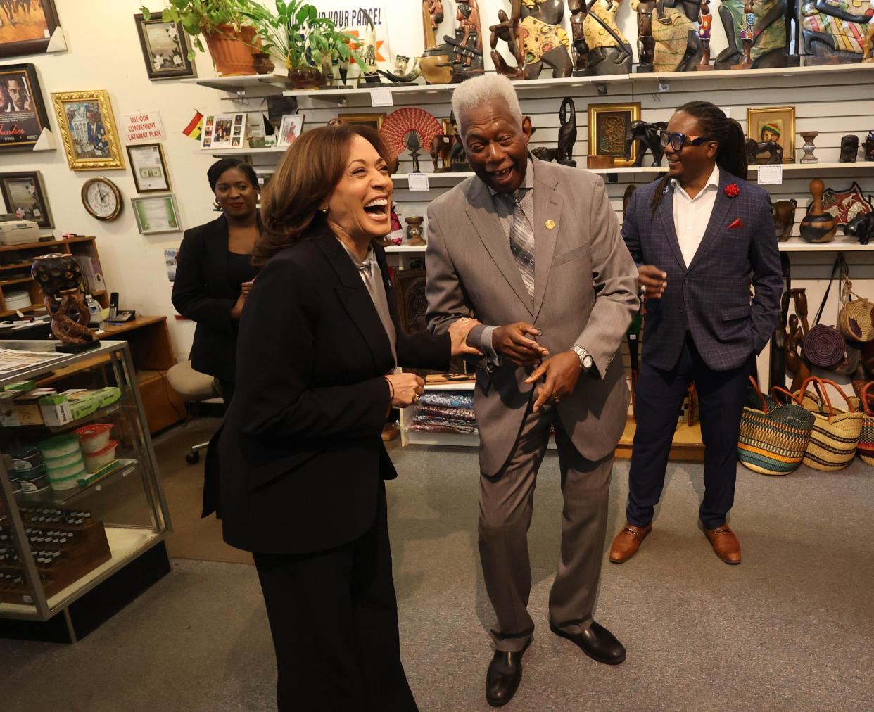 U.S. Vice President Kamala Harris laughs as she visits with Robert Shinhoster at Diaspora Savannah, GA on Tuesday, February 6, 2024 for the 3rd stop on her nationwide “Fight for Reproductive Freedoms” tour.