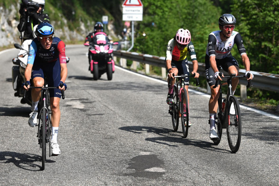 Brandon McNulty (right) battles with Ben Healy (centre) and Marco Frigo (left) on stage 15