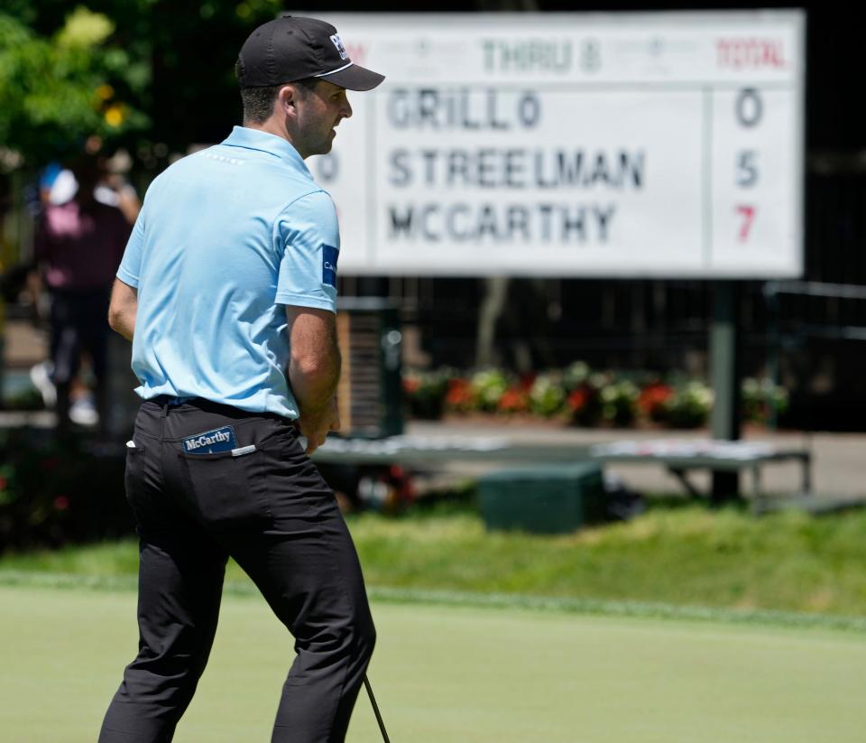 June 3, 2022; Dublin, Ohio, USA; Denny McCarthy eyes his putt on the eighteenth green during the second round of the Memorial Tournament held at Muirfield Village Golf Club in Dublin, Ohio, on Friday, June 3, 2022. Mandatory Credit: Barbara J. Perenic/Columbus Dispatch