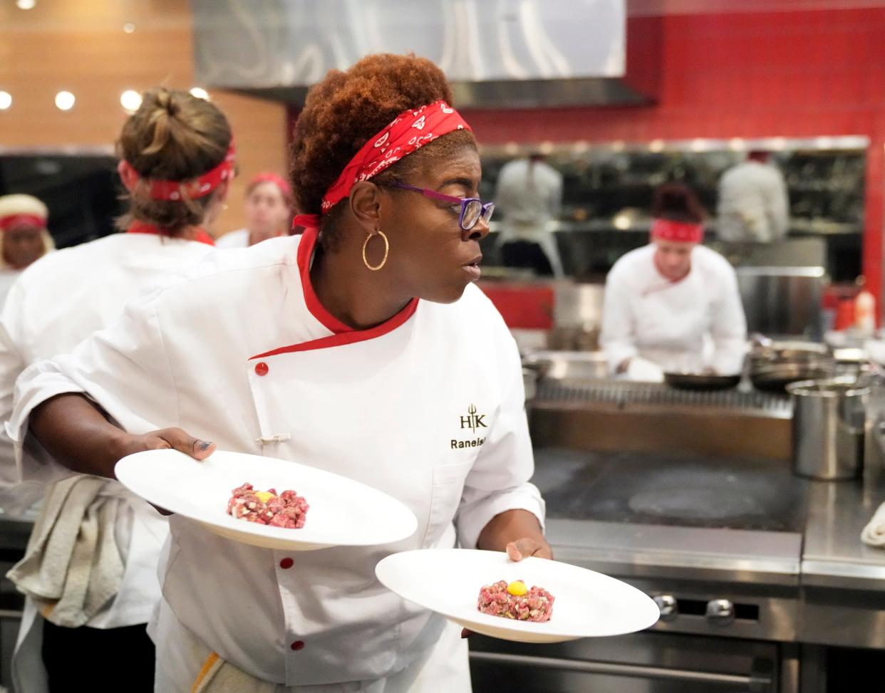 Contestant Raneisha Conerly prepares a dish in the “Gimme an H!” episode of "Hell's Kitchen," which airs Thursday, Oct. 19, 2023, on FOX.