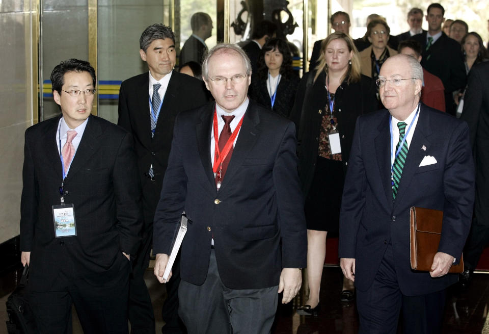 I n this March 17 2007 file photo, Victor Cha (L), then the U.S. National Security Council's director for Asian Affairs, arrives with U.S. Assistant Secretary of State Christopher Hill (C), and Ambassador to China Clark Randt (R), at the opening of denuclearization negotiations with North Korea in Beijing