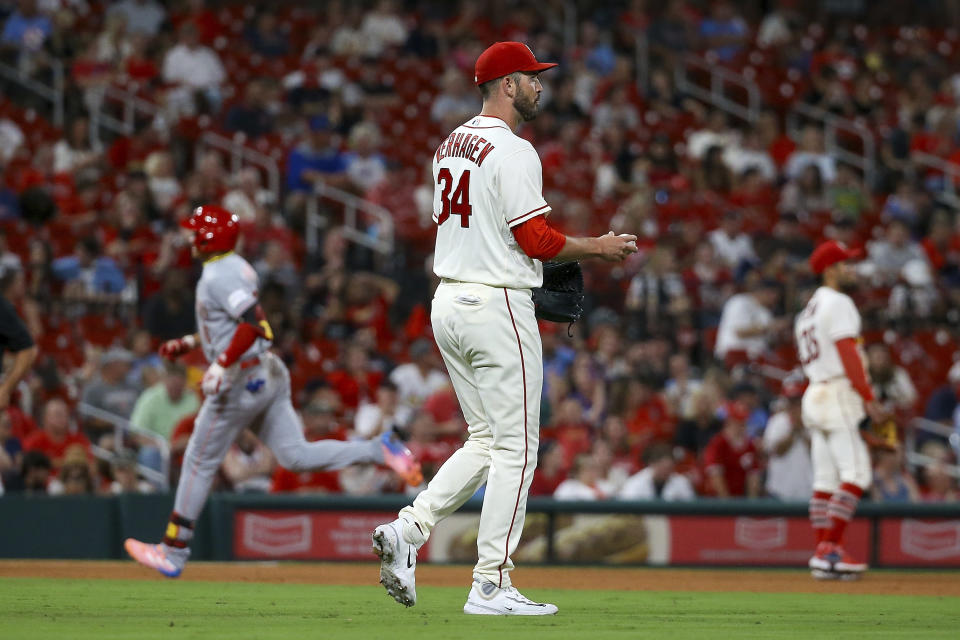 St. Louis Cardinals relief pitcher Drew VerHagen (34) walks back to the mound after giving up a solo home run to Cincinnati Reds' Noelvi Marte during the seventh inning of a baseball game Saturday, Sept. 30, 2023, in St. Louis. (AP Photo/Scott Kane)