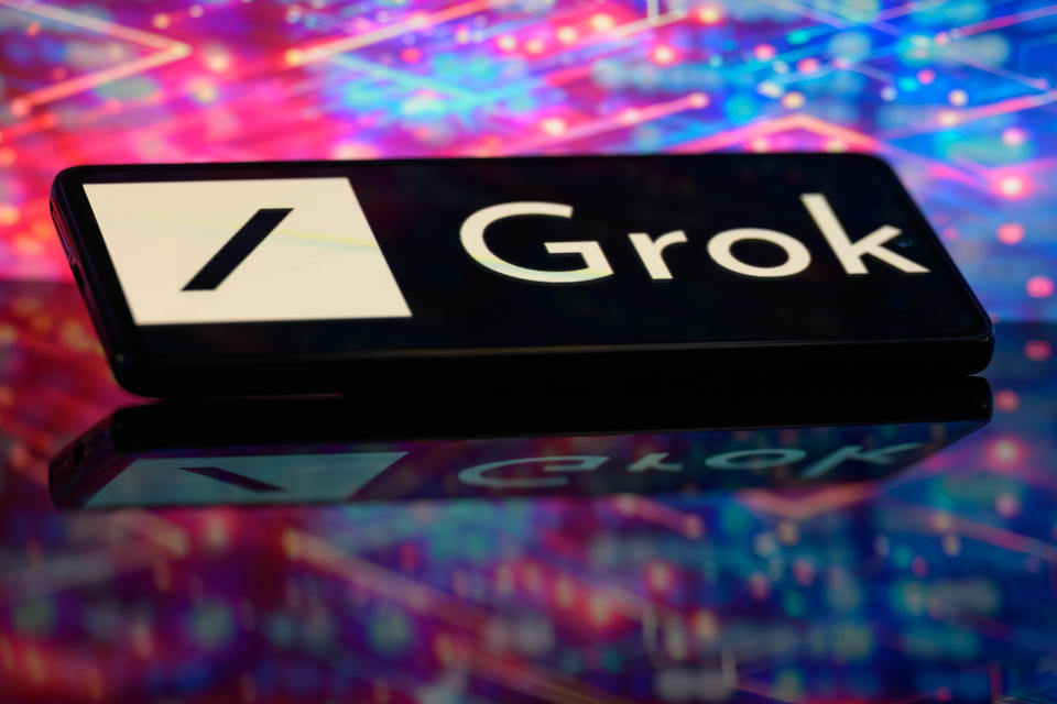 The Grok logo is being displayed on a smartphone in this photo illustration in Brussels, Belgium, on June 10, 2024. (Photo Illustration by Jonathan Raa/NurPhoto via Getty Images)