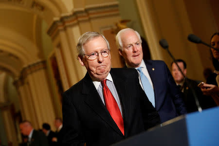 Senate Majority Leader Mitch McConnell and Sen. John Cornyn (R-TX) arrive to speak with reporters following the party luncheons on Capitol Hill in Washington, U.S. November 14, 2017. REUTERS/Aaron P. Bernstein