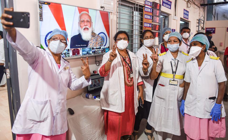 Mumbai: Doctors and health workers take a selfie, after the virtual launch of COVID-19 vaccination drive by Prime Minister Narendra Modi, at Rajawadi hospital in Mumbai, on Saturday, 16 January 2021.