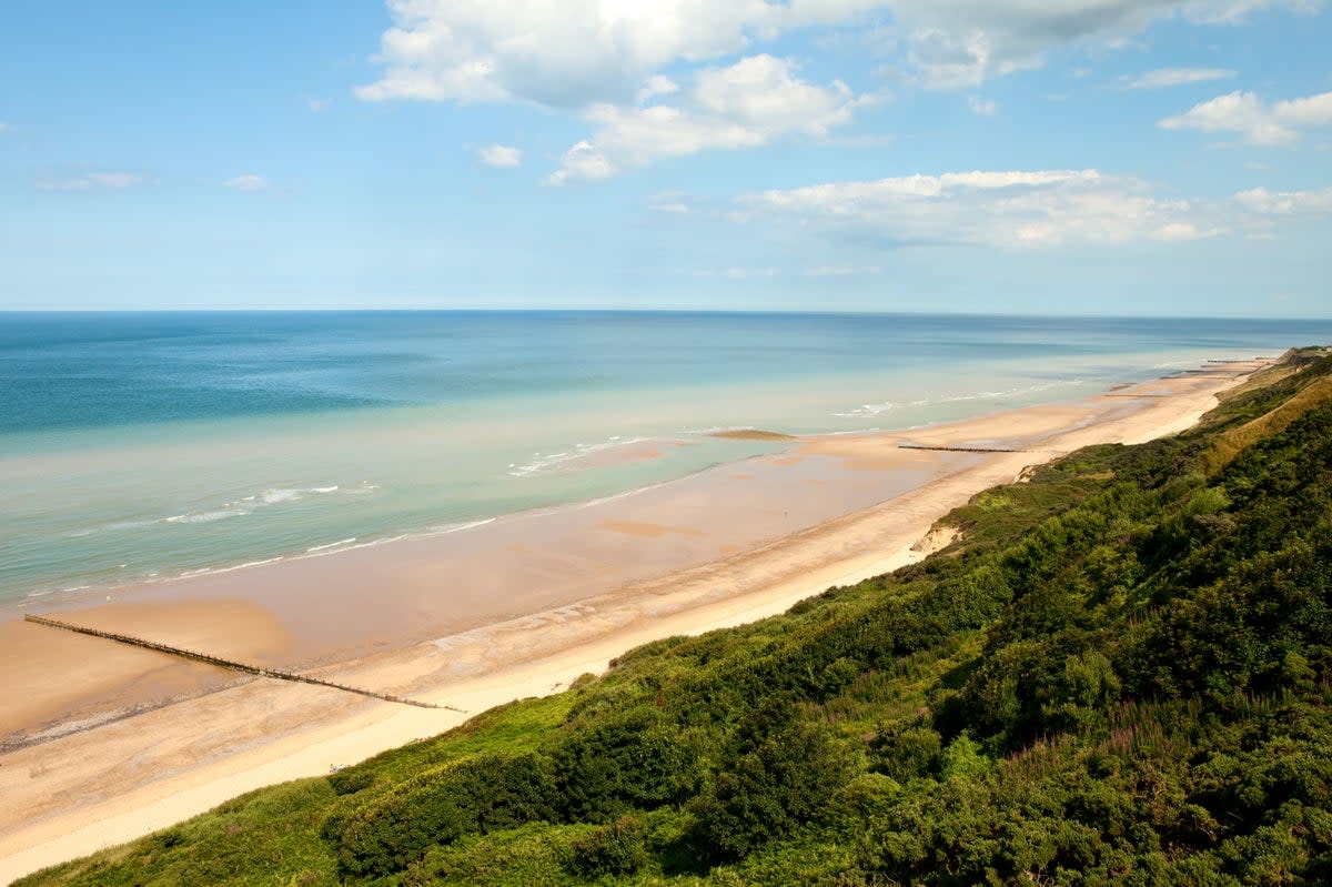 The spectacular Norfolk coast remains one of the county’s major lures  (Getty/iStock)