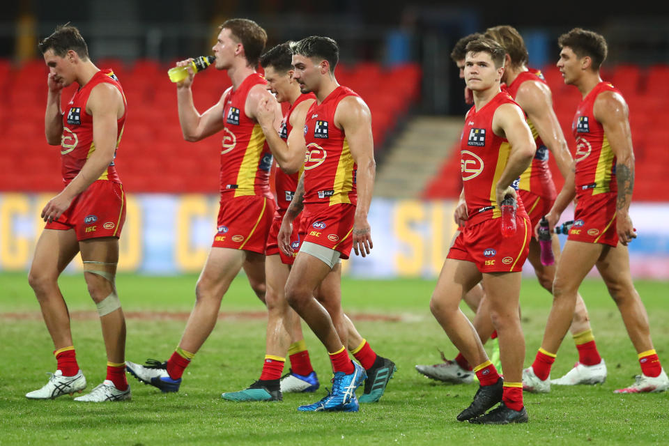 Suns leave the field at full time during the round 11 AFL match between the Gold Coast Suns and the Essendon Bombers.