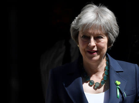 Britain's Prime Minister Theresa May leaves 10 Downing Street in London, June 13, 2018. REUTERS/Toby Melville/File Photo