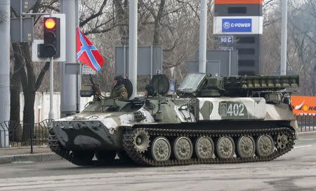 Pro-Russian rebels drive a self-propelled anti-aircraft system Strela-10 in Donetsk February 3, 2015. REUTERS/Maxim Shemetov