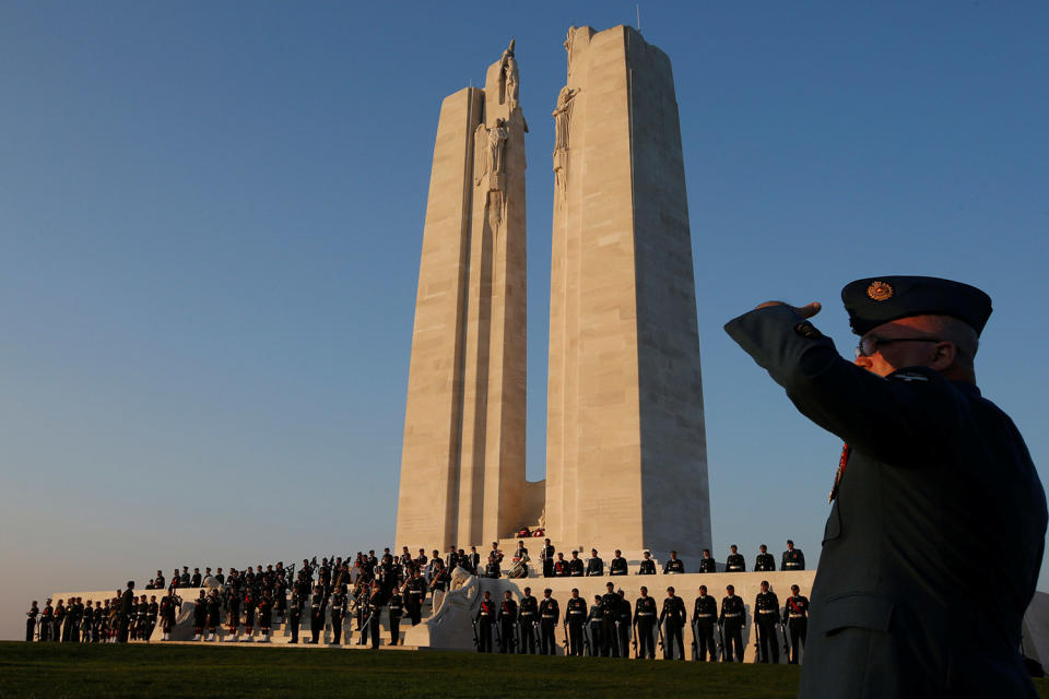 Canadian soldiers attend the sunset ceremony at Vimy Canadian National Memorial