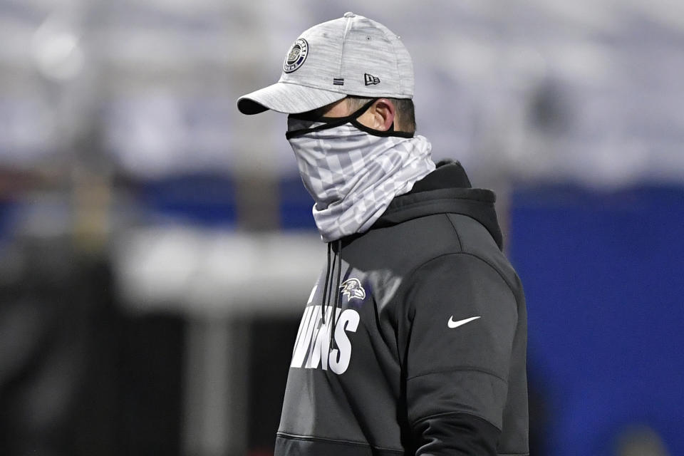 Baltimore Ravens head coach John Harbaugh leaves the field after an NFL divisional round football game against the Buffalo Bills Saturday, Jan. 16, 2021, in Orchard Park, N.Y. The Bills won 17-3. (AP Photo/Adrian Kraus)