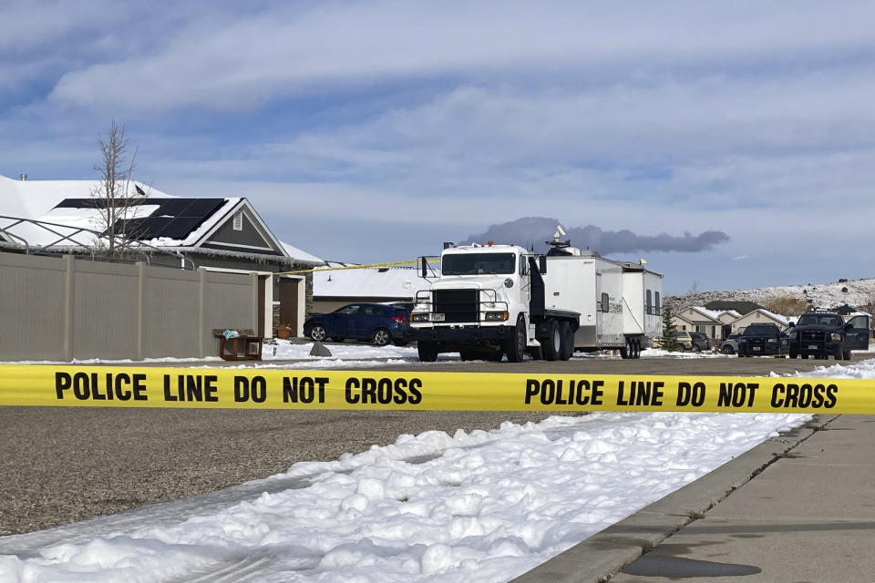 FILE - Police continue their investigation at a home where eight family members were found dead in Enoch, Utah, on Jan. 5, 2023. A Utah man who fatally shot his wife, her mother and their five kids before turning the gun on himself detailed his anger toward his wife in his suicide note, investigators wrote in a report released on Friday, April 7, 2023. (AP Photo/Sam Metz, File)