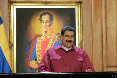 Venezuela's President Nicolas Maduro smiles during a meeting with representatives of the health sector at Miraflores Palace in Caracas, Venezuela October 13, 2017. Miraflores Palace/Handout via REUTERS