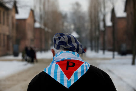 A survivor is seen at the former Nazi German concentration and extermination camp Auschwitz, as he attends ceremonies marking the 74th anniversary of the liberation of the camp and International Holocaust Victims Remembrance Day, in Oswiecim, Poland, January 27, 2019. REUTERS/Kacper Pempel