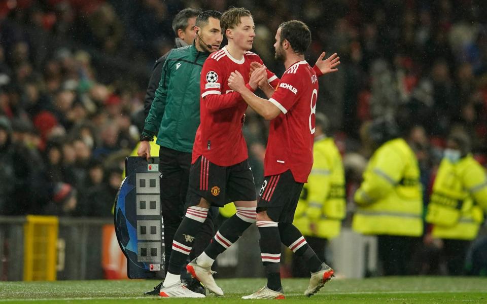 Manchester United's Charlie Savage takes to the field after coming on from the bench to replace Manchester United's Juan Mata - AP