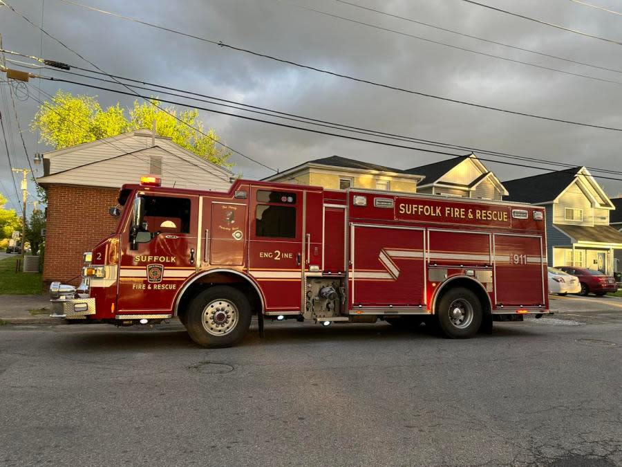 Car strikes building on Wellons St. (Courtesy: Suffolk Department of Fire and Rescue)