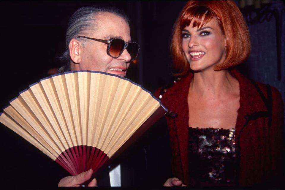 <div class="inline-image__caption"><p>Linda Evangelista and Karl Lagerfeld attend a Chanel fashion event in New York City on September 12, 1991.</p></div> <div class="inline-image__credit">Sonia Moskowitz/Getty Images</div>