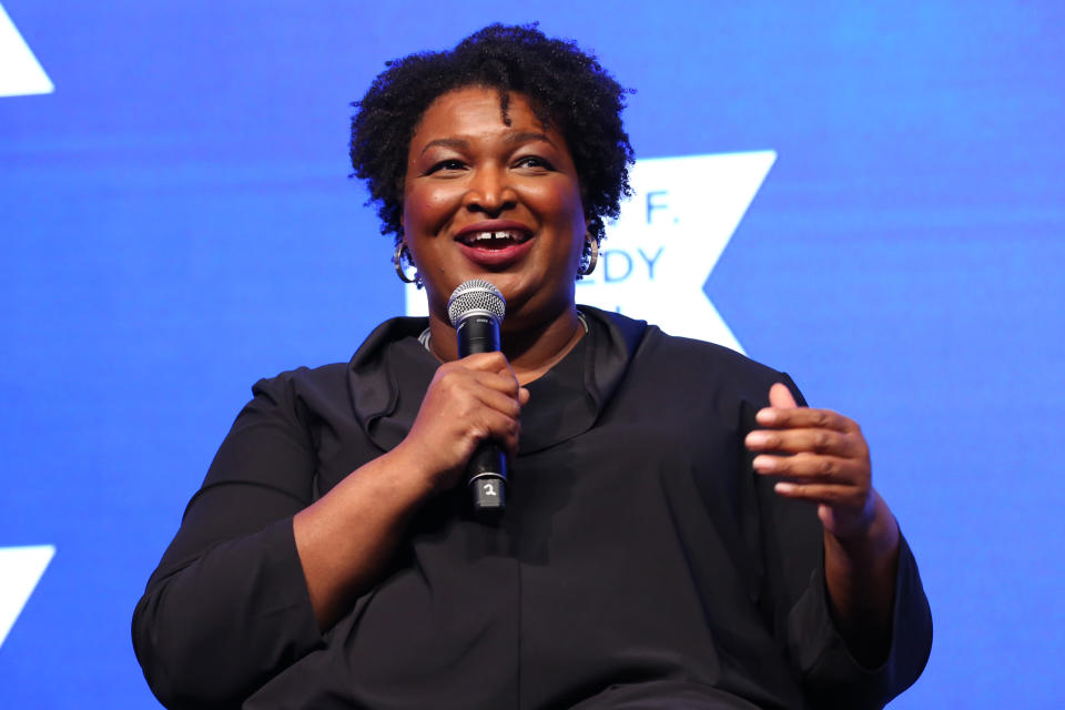 NEW YORK, NEW YORK - DECEMBER 09: Stacey Abrams speaks onstage during the 2021 Robert F. Kennedy Human Rights Ripple of Hope Award Gala on December 09, 2021 in New York City. (Photo by Monica Schipper/Getty Images for Robert F. Kennedy Human Rights)