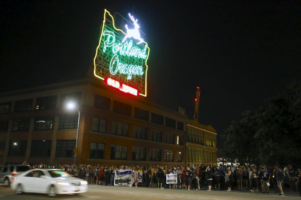 Marijuana enthusiasts gather before midnight to celebrate the legalization of recreational use of marijuana in Portland, Oregon June 30, 2015. Smoking and growing small amounts of marijuana became legal in Oregon on Wednesday, as a growing legalization movement spread down the United States' west coast. A law allowing recreational use, backed by voters in November, came into effect at midnight, opening the way for marijuana to be sold in shops by next year - though some lawmakers say they will still try to block retail outlets. Picture taken June 30, 2015. REUTERS/Steve Dipaola