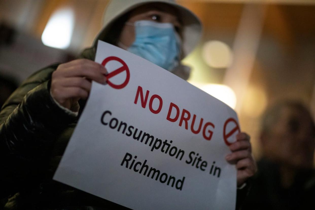 Demonstrators against the proposed supervised consumption site are pictured outside of Richmond City Hall on Feb. 13.  (Ben Nelms/CBC - image credit)