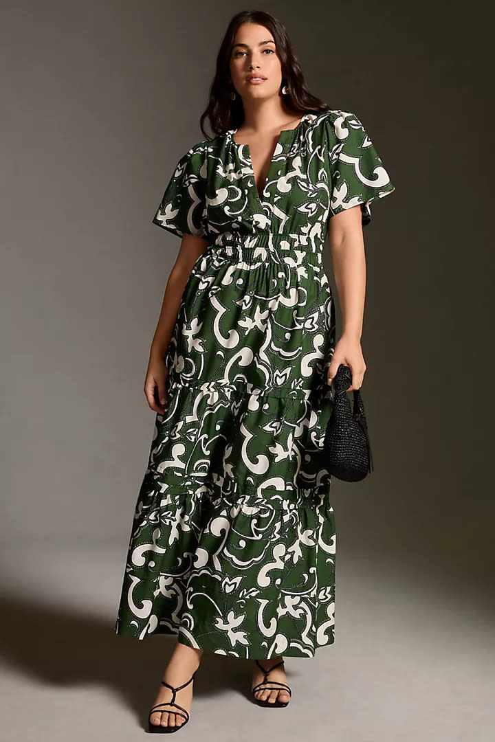 MOdel wears Anthropologie green and white patterned The Somerset Maxi Dress