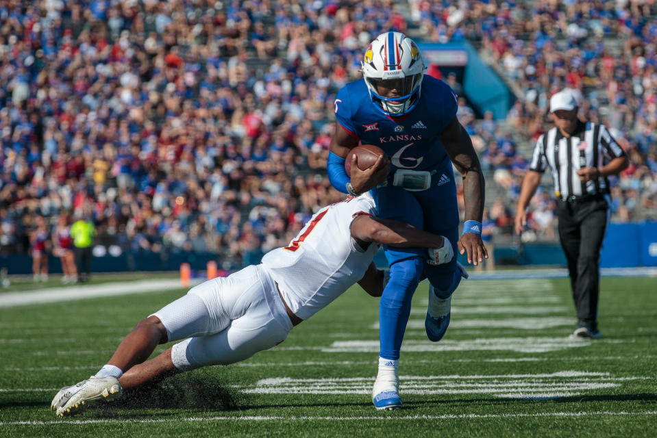 Oct 1, 2022; Lawrence, Kansas, USA; Kansas Jayhawks quarterback <a class="link " href="https://sports.yahoo.com/ncaaf/players/315155" data-i13n="sec:content-canvas;subsec:anchor_text;elm:context_link" data-ylk="slk:Jalon Daniels;sec:content-canvas;subsec:anchor_text;elm:context_link;itc:0">Jalon Daniels</a> (6) heads towards the end zone during the second quarter against the Iowa State Cyclones at David Booth Kansas Memorial Stadium. William Purnell-USA TODAY Sports