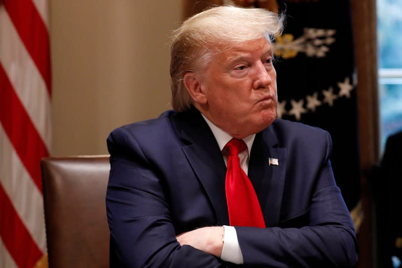 U.S. President Donald Trump participates in a listening session on youth vaping and the electronic cigarette epidemic inside the Cabinet Room at the White House in Washington