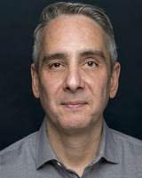 Headshot of Eduardo Vives of Shure.