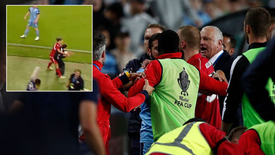 Wild scenes ensued after the ballboy hit the ground. Pic: Getty/Fox Sports