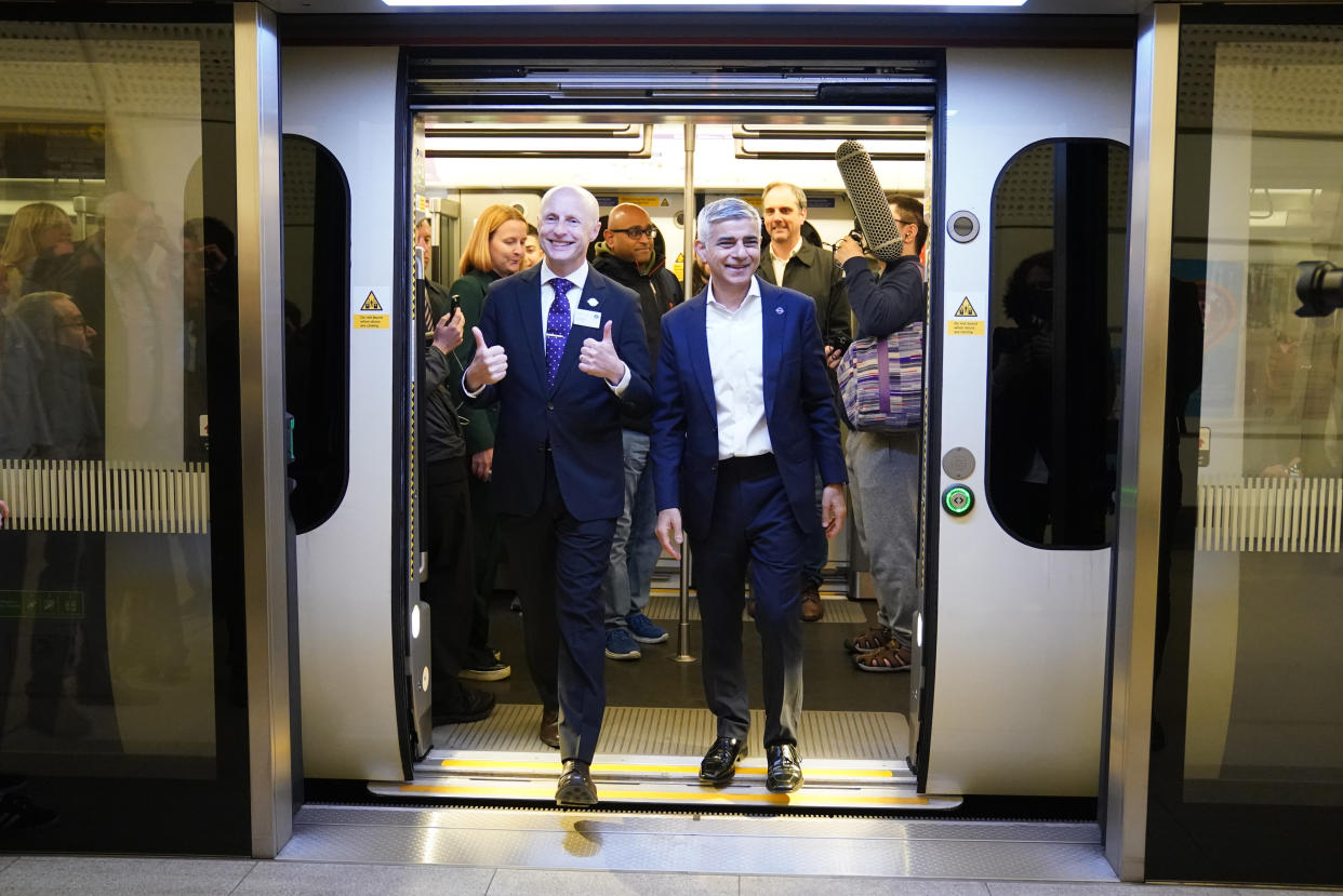 Mayor of London Sadiq Khan (right) and Andy Byford, commissioner at TfL disembark the first Elizabeth line train to carry passengers at Farringdon Station. Photo: Kirsty O'Connor/PA