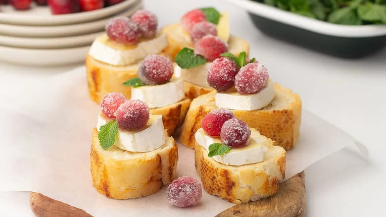 Brie on toasted bread with sugaraed cranberries