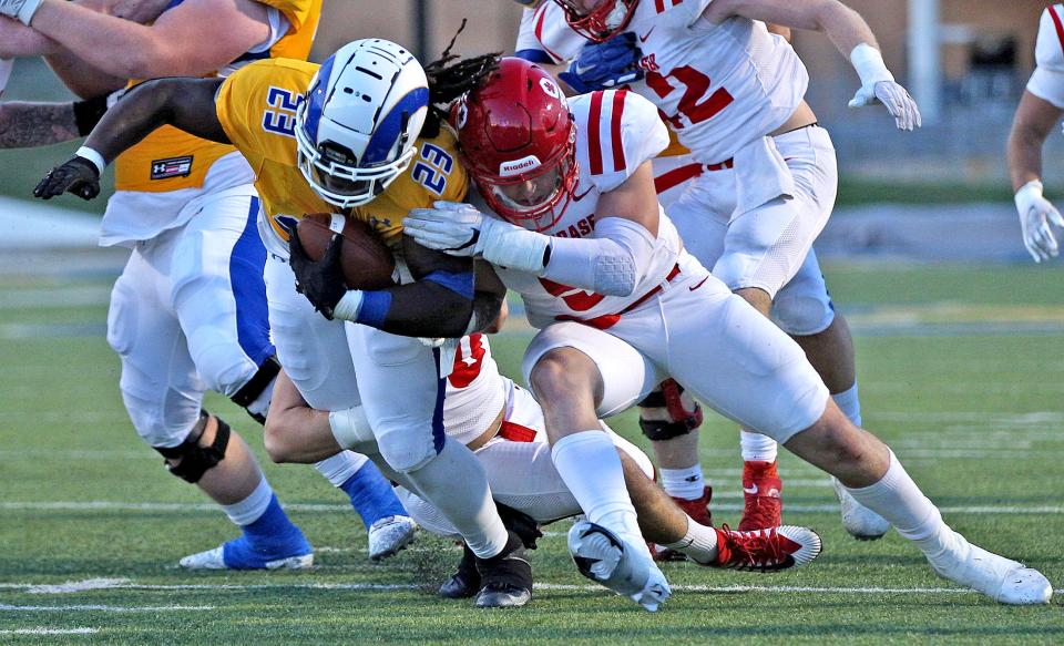 Nathaniel Omayebu III (23) rushes the ball for Angelo State University during a game against Simon Fraser on Saturday, Oct. 23, 2021.