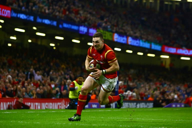 Wales' wing George North runs in his second try during the Six Nations international rugby union match between Wales and Ireland at the Principality Stadium in Cardiff, south Wales, on March 10, 2017