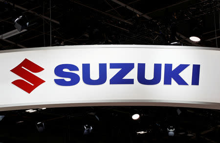 Suzuki Motor says Japan tax rise, India uncertainty to limit profit growth