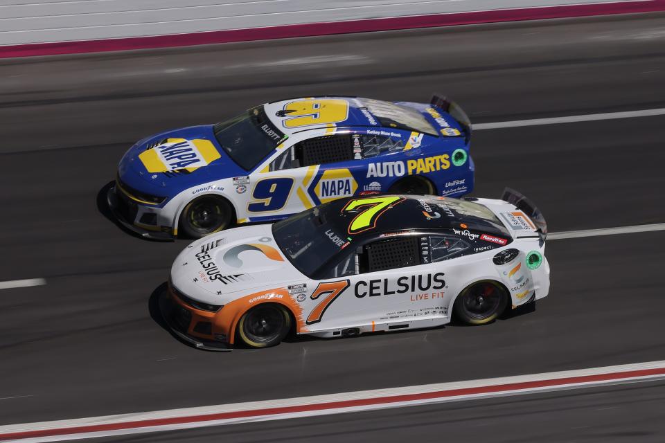 Corey LaJoie (7) drives to the inside of Josh Berry (9) during Sunday's NASCAR Cup Series race at Atlanta Motor Speedway. LaJoie went on to score a career-best, fourth-place finish.