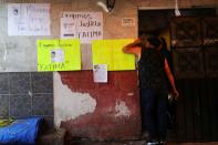 People arrive at the home of seven-year-old Fatima Cecilia Aldrighett, who went missing on February 11 and whose body was discovered over the weekend inside a plastic garbage bag, in Mexico City