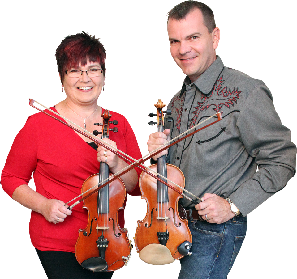 Scott and Kendra Woods play their fiddles on Jan. 14 in Leesburg.