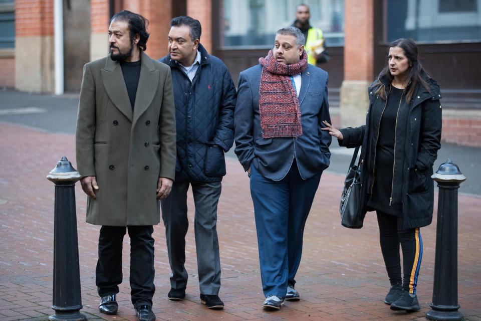 Mohamed Saleem (second right) husband and step-father to the victims, at Birmingham Crown Court (PA)