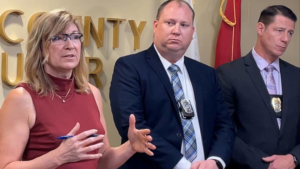 Jackson County Prosecutor Jean Peters Baker (left) announced during a press conference Friday that 36-year-old Isiah Clinton has been charged with three counts of first-degree murder and other charges in the Klymax Lounge nightclub shooting. Kansas City police Detective Ryan Taylor (center) and Sgt. Mark Slater, supervisor of the homicide squad, also talked about details of the case.