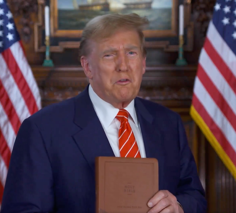 Former President Donald Trump holding Bible. - Photo: <a class="link " href="https://twitter.com/TheLeeGreenwood/status/1772661115572371616?ref_src=twsrc%5Etfw%7Ctwcamp%5Etweetembed%7Ctwterm%5E1772661115572371616%7Ctwgr%5E7c383209c5b1b6297a0adae10d628a6cab974b07%7Ctwcon%5Es1_&ref_url=https%3A%2F%2Fwww.newsweek.com%2Fdonald-trumps-trying-sell-bibles-1883722" rel="nofollow noopener" target="_blank" data-ylk="slk:X/ LeeGreenwood;elm:context_link;itc:0;sec:content-canvas">X/ LeeGreenwood</a>