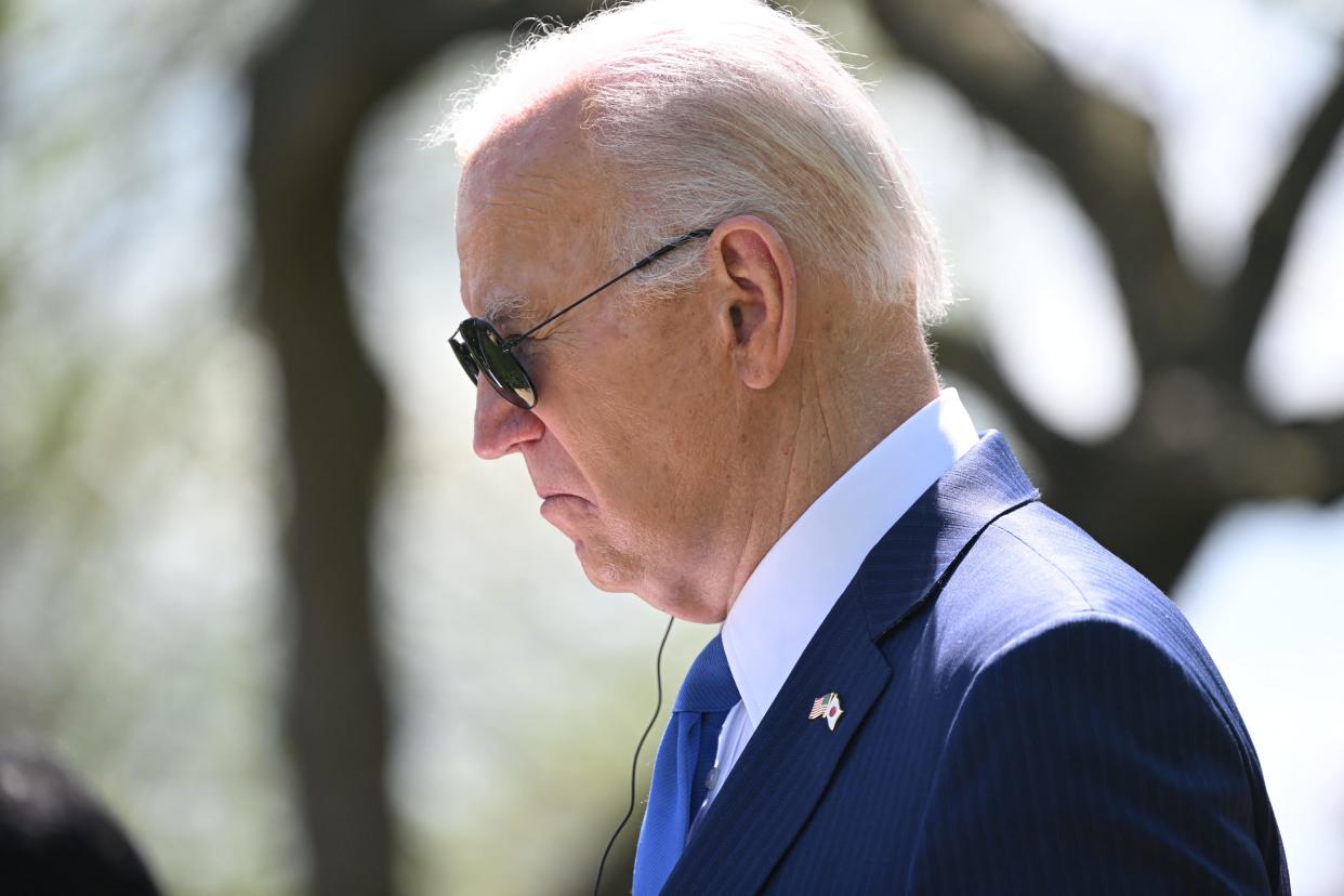 US President Joe Biden listens during a joint press conference with Japanese Prime Minister Fumio Kishida (out of frame) in the Rose Garden of the White House in Washington, DC, April 10, 2024. (Photo by SAUL LOEB / AFP) (Photo by SAUL LOEB/AFP via Getty Images)