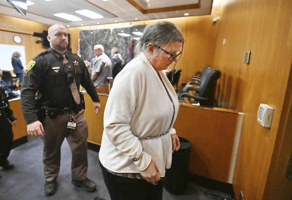 Defendant Jennifer Crumbley exits the courtroom after the jury's unanimous verdict of guilty of involuntary manslaughter on all counts at the conclusion of her trial in the courtroom of Judge Cheryl Matthews at Oakland County Circuit Court in Pontiac, Mich., on Tuesday, Feb. 6, 2024. (Daniel Mears/Detroit News via AP)