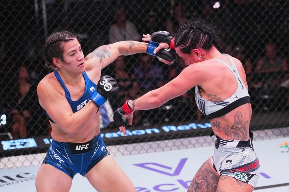 LAS VEGAS, NEVADA – JULY 15: (L-R) Ailin Perez of Argentina punches Ashlee Evans-Smith in their women’s bantamweight fight during the UFC Fight Night at UFC APEX on July 15, 2023 in Las Vegas, Nevada. (Photo by Jeff Bottari/Zuffa LLC via Getty Images)