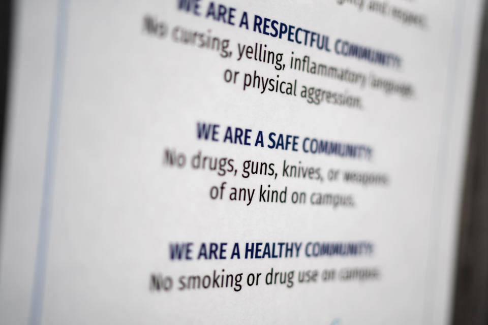 A sign is posted in an elevator prohibiting guns on the campus of Asbury First United Methodist Church, Tuesday, Aug. 22, 2023, in Rochester, N.Y. (AP Photo/David Goldman)