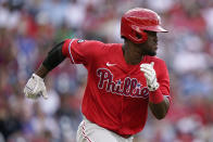 Philadelphia Phillies' Odubel Herrera singles in the seventh inning of a baseball game against the Washington Nationals, Thursday, Aug. 5, 2021, in Washington. Alec Bohm scored on the play. (AP Photo/Patrick Semansky)